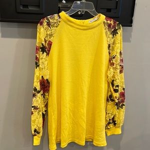 Miholl size large top with long sleeves. Lacy and colorful sleeves.